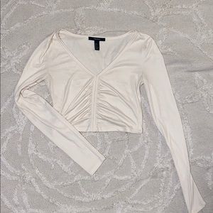 Cream rouched front, long sleeve crop top
